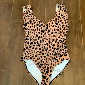 Brand New Never Worn women’s leopard print swimsuit. Size Medium.